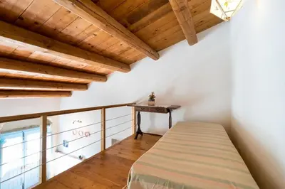 Letto o letti in una camera di Casa Sarculla