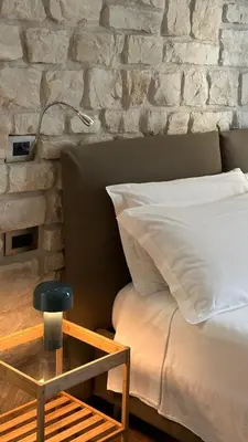 Letto o letti in una camera di Olivia Rooms Teocrito