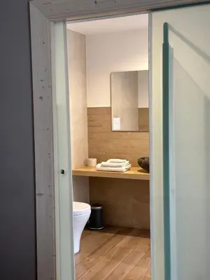 Bagno di Olivia Rooms Teocrito