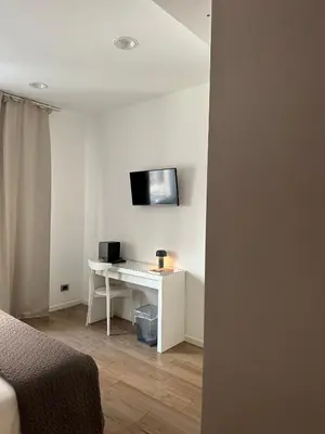 TV o dispositivi per l'intrattenimento presso Olivia Rooms Teocrito