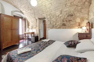 Letto o letti in una camera di Locanda La Meridiana