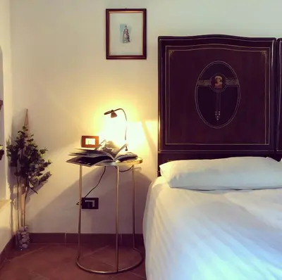 Letto o letti in una camera di Appartamento Il Cappero