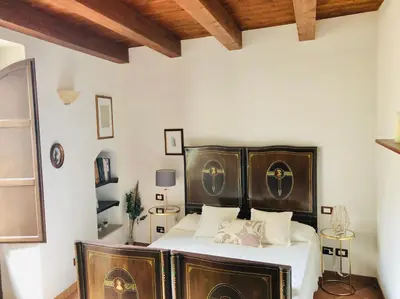 Letto o letti in una camera di Appartamento Il Cappero