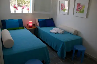 Letto o letti in una camera di Villa Porto Ulisse
