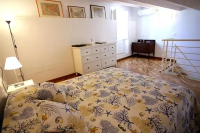 Letto o letti in una camera di DentrOrtigia