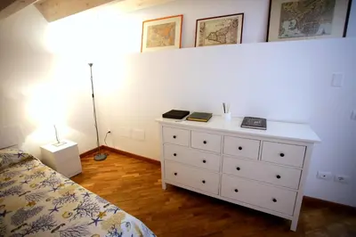 Letto o letti in una camera di DentrOrtigia