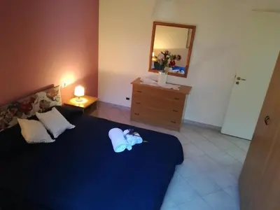 Letto o letti in una camera di Profumo di Mare Fronte Spiaggia