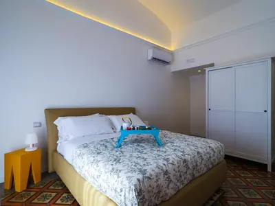 Letto o letti in una camera di B&B Sciara Larmisi