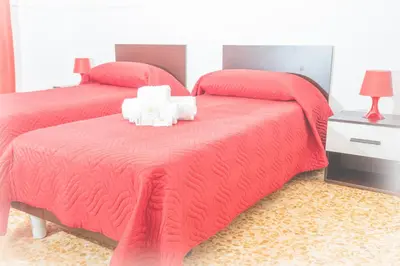 Letto o letti in una camera di Casa Rosalba