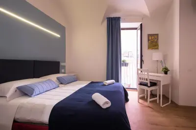 Letto o letti in una camera di Cianciana