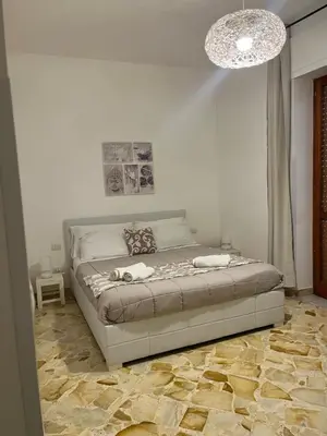 Letto o letti in una camera di Alexander Rooms and appartament