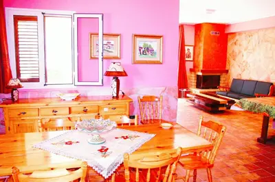 Area soggiorno di Happy Holiday Villa - Pool & Garden
