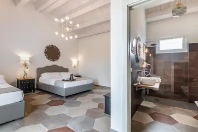 Letto o letti in una camera di Baglio Genovesi