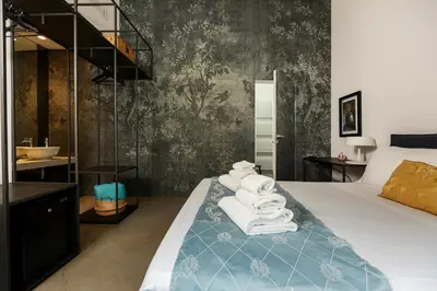 Letto o letti in una camera di Embrace Sicily Guest House
