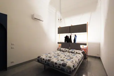 Letto o letti in una camera di Pasitea