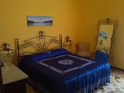 Letto o letti in una camera di Happy House Wifi Free Bici Free