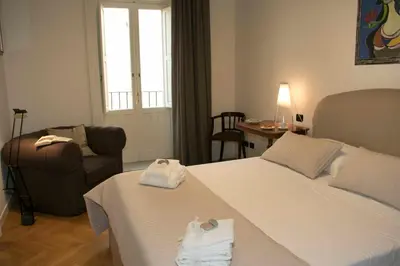 Letto o letti in una camera di Alagona House