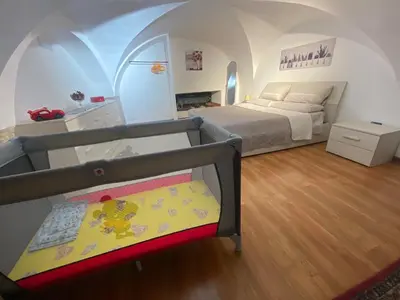 Letto o letti in una camera di Casa trinità
