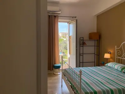 Letto o letti in una camera di Bellassai Rooms