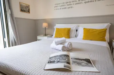Letto o letti in una camera di Casa dei Ré