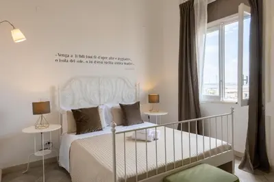 Letto o letti in una camera di Casa dei Ré