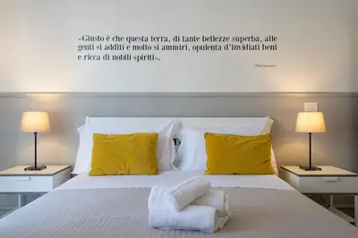 Letto o letti in una camera di Casa dei Ré