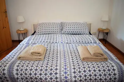 Letto o letti in una camera di Casa Bedda