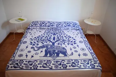 Letto o letti in una camera di Casa Bedda