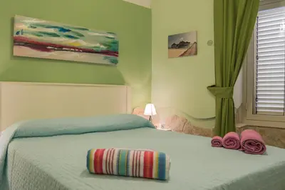 Letto o letti in una camera di La Nicchia 2