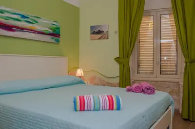 Letto o letti in una camera di La Nicchia 2