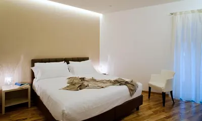 Letto o letti in una camera di Casa Majore