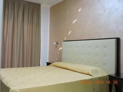 Letto o letti in una camera di B&B Aquila Reale