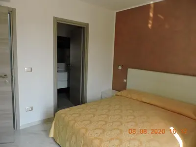 Letto o letti in una camera di B&B Aquila Reale