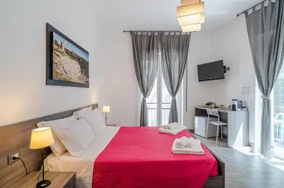 Letto o letti in una camera di Cavour Rooms