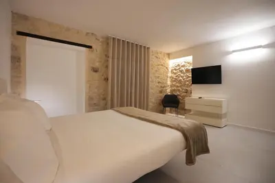 Letto o letti in una camera di Keys of Sicily - Appartamenti Modica Bassa