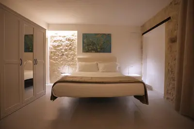Letto o letti in una camera di Keys of Sicily - Appartamenti Modica Bassa