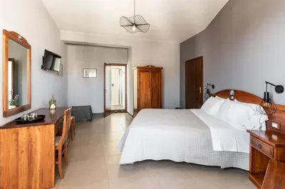 Letto o letti in una camera di B&B La terrazza sul mare