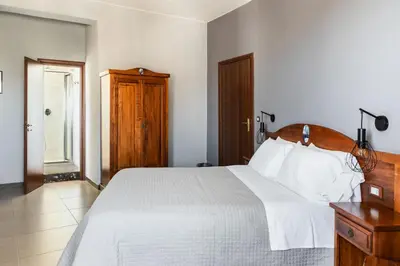 Letto o letti in una camera di B&B La terrazza sul mare