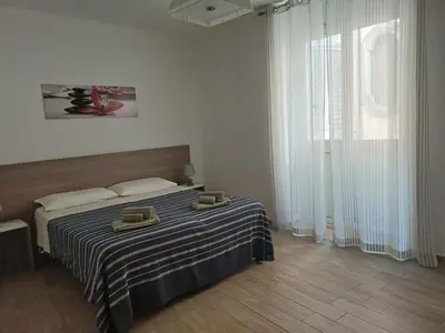 Letto o letti in una camera di Casa Trinacria