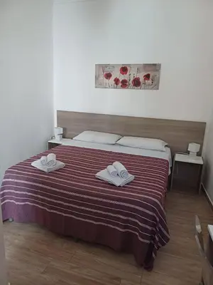 Letto o letti in una camera di Casa Trinacria