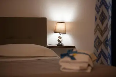 Letto o letti in una camera di Residenze dello Scirocco