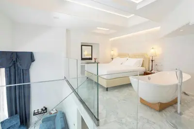 Letto o letti in una camera di Ortea Palace Hotel, Sicily, Autograph Collection