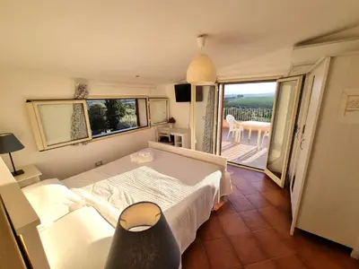 Letto o letti in una camera di B&B Villa Sant'Antonio