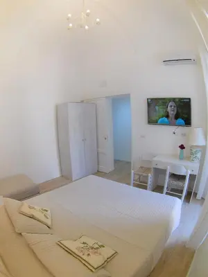 Letto o letti in una camera di Duomo Sant'Agata Apartment