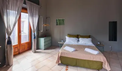Letto o letti in una camera di Terrazza Santa Chiara