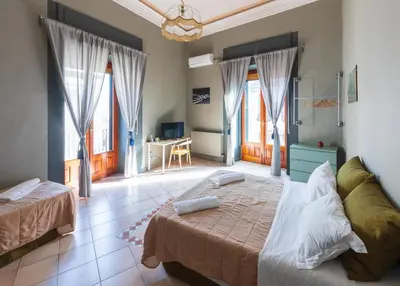 Letto o letti in una camera di Terrazza Santa Chiara