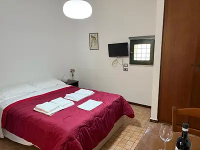 Letto o letti in una camera di In front of Castello Ursino