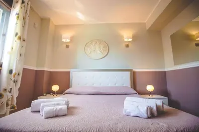 Letto o letti in una camera di Casale Santuzza - Xenia Sicily Villas