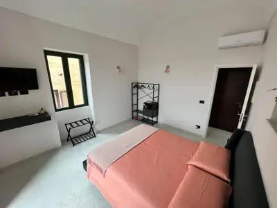 Letto o letti in una camera di La Casa Di Chloe