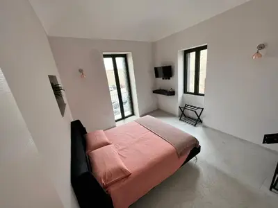 Letto o letti in una camera di La Casa Di Chloe